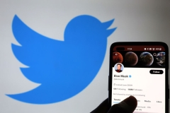 The Twitter account of Elon Musk is displayed on a smartphone with a Twitter logo in the background on November 21, 2022 in Newcastle Under Lyme, England. (Photo by Nathan Stirk/Getty Images) The Twitter account of Elon Musk is displayed on a smartphone with a Twitter logo in the background on November 21, 2022 in Newcastle Under Lyme, England. (Photo by Nathan Stirk/Getty Images)