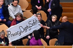Women opposed to the Scottish gender recognition legislation are confronted while holding up a banner in the public gallery of the Scottish Parliament during the vote last month. (Photo by Ken Jack / Getty Images) Women opposed to the Scottish gender recognition legislation are confronted while holding up a banner in the public gallery of the Scottish Parliament during the vote last month. (Photo by Ken Jack / Getty Images)