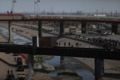 Migrants, mostly of Venezuelan origin, attempt to forcibly cross into the United States at the Paso del Norte International Bridge in Ciudad Juarez, Chihuahua state, Mexico, on March 12, 2023. - Hundreds of migrants, mostly Venezuelans, attempted to stampede across one of the border bridges in the northern Mexican city of Ciudad Juarez, desperate to gain asylum in the United States. (Photo by HERIKA MARTINEZ/AFP via Getty Images) Migrants, mostly of Venezuelan origin, attempt to forcibly cross into the United States at the Paso del Norte International Bridge in Ciudad Juarez, Chihuahua state, Mexico, on March 12, 2023. - Hundreds of migrants, mostly Venezuelans, attempted to stampede across one of the border bridges in the northern Mexican city of Ciudad Juarez, desperate to gain asylum in the United States. (Photo by HERIKA MARTINEZ/AFP via Getty Images)