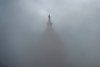 A stormy day at the U.S. Capitol in Washington, D.C. (Photo by ANDREW CABALLERO-REYNOLDS/AFP via Getty Images)