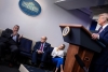 Former New York City Mayor Rudy Giuliani, White House Press Secretary Kayleigh McEnany, and President Donald Trump listen while former New Jersey Governor Chris Christie speaks during a briefing at the White House September 27, 2020. (Photo by BRENDAN SMIALOWSKI/AFP via Getty Images)