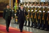 China's People's Liberation Army (PLA) General Li Zuocheng and then-US Army Chief of Staff General Mark Milley review an honor guard during a welcome ceremony in Beijing on August 16, 2016. (Photo by MARK SCHIEFELBEIN/AFP via Getty Images)