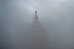 A stormy day at the U.S. Capitol in Washington, D.C. (Photo by ANDREW CABALLERO-REYNOLDS/AFP via Getty Images)