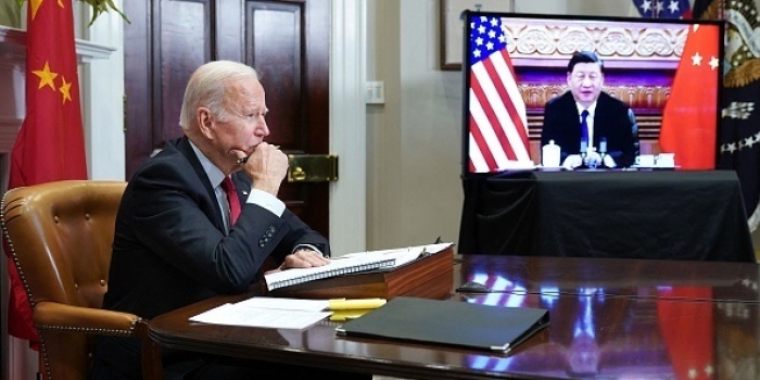 President Biden holds a virtual meeting with Chinese President Xi Jinping last November. (Photo by Mandel Ngan/AFP via Getty Images)