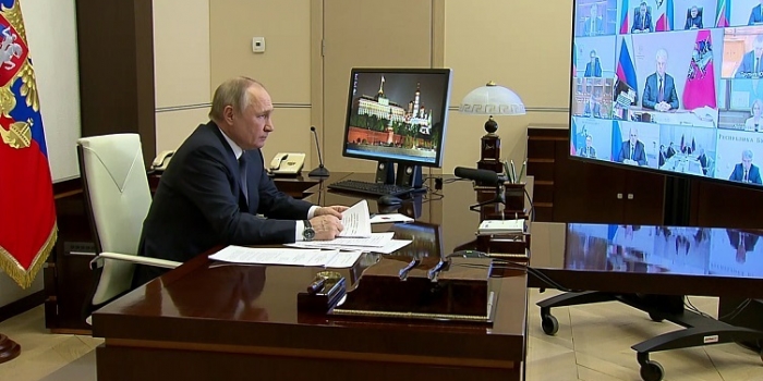 Russian President Vladimir Putin chairs a teleconference meeting with members of the government. (Photo by Mikhail Klimentyev/ Sputnik /AFP via Getty Images)