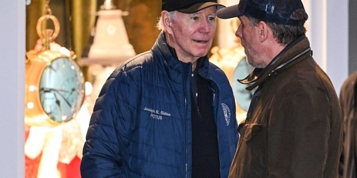 President Joe Biden talks to his son Hunter Biden while shopping in Nantucket, Massachusetts, on November 25, 2022. (Photo by MANDEL NGAN/AFP via Getty Images)